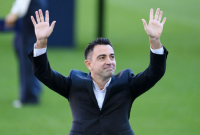 Xavi sesumbar bahwa Barcelona kembali dalam perburuan gelar setelah mengalahkan Real Madrid 4-0.